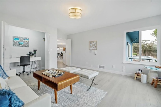 living room featuring light wood-type flooring