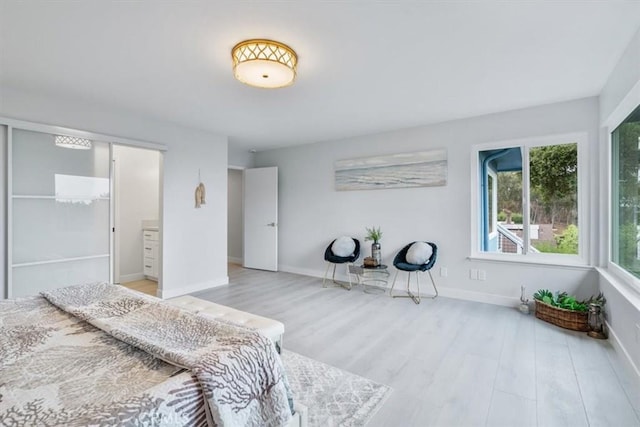 bedroom with light hardwood / wood-style flooring