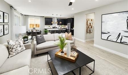 living room with light hardwood / wood-style flooring