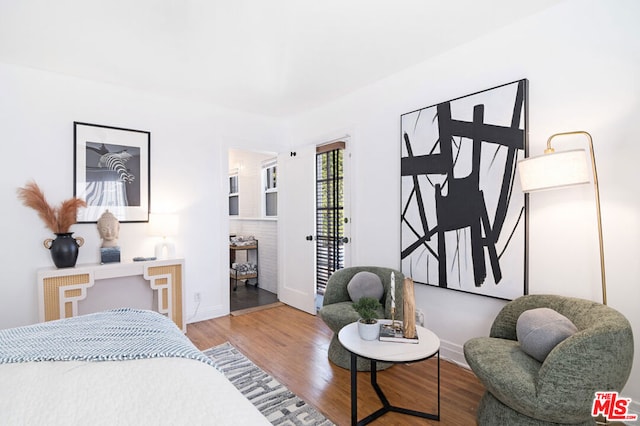 bedroom featuring wood-type flooring