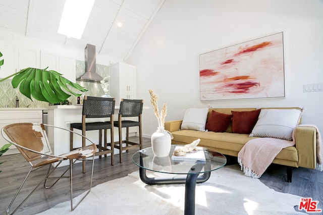 living room with high vaulted ceiling, wooden ceiling, and hardwood / wood-style flooring