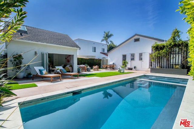 view of pool with a patio