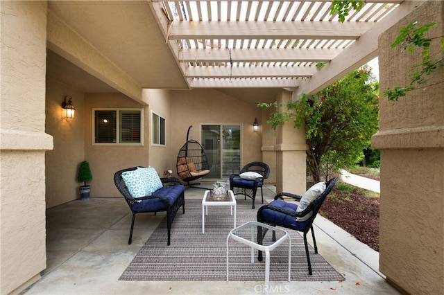 view of patio / terrace featuring outdoor lounge area and a pergola