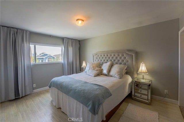 bedroom featuring light wood-type flooring