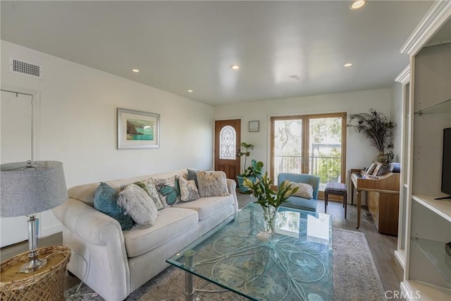 living room with hardwood / wood-style floors