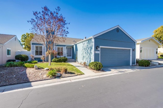 single story home with a garage