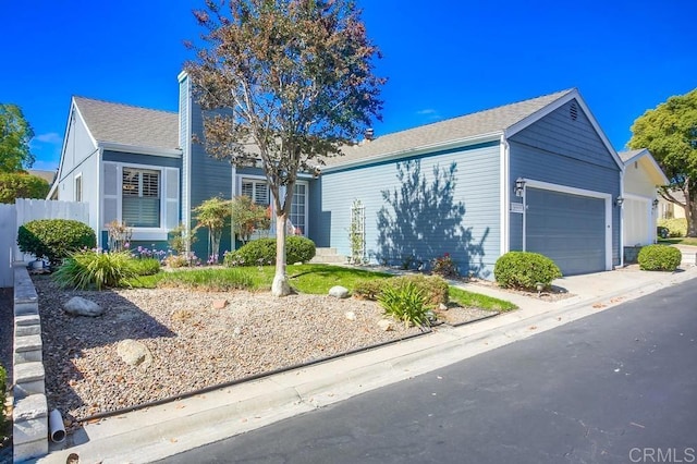 single story home featuring a garage