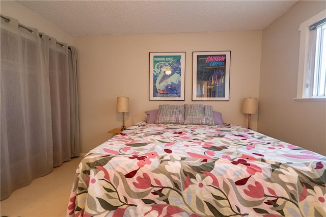 bedroom featuring a textured ceiling