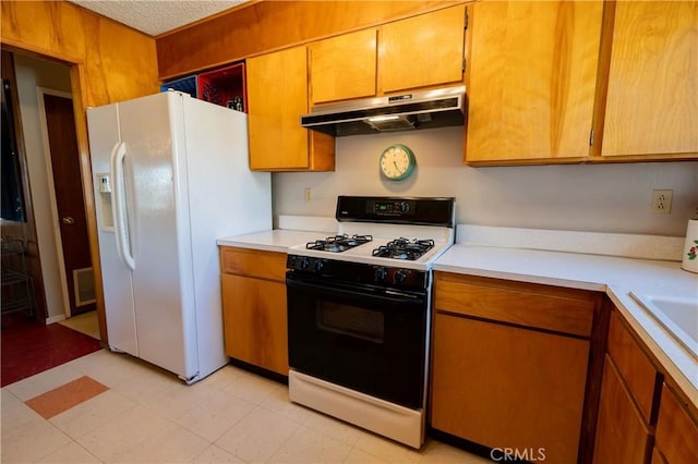 kitchen featuring white appliances