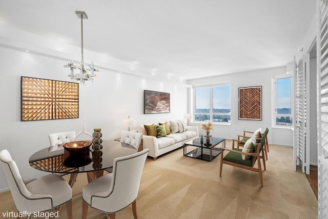 carpeted living room featuring an inviting chandelier