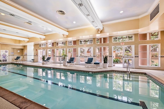 view of pool with french doors