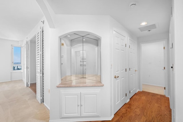 hall featuring light hardwood / wood-style flooring