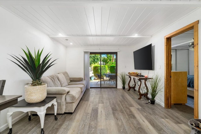 living room with light wood-type flooring, ceiling fan, and wood ceiling