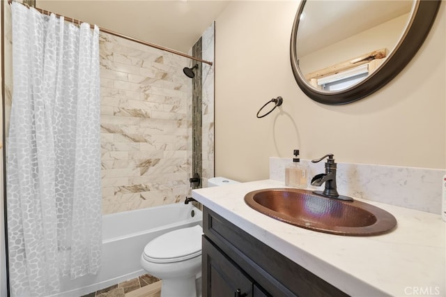 full bathroom featuring vanity, toilet, and shower / tub combo with curtain