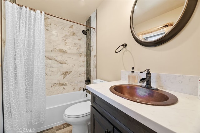 full bathroom featuring vanity, toilet, and shower / tub combo with curtain