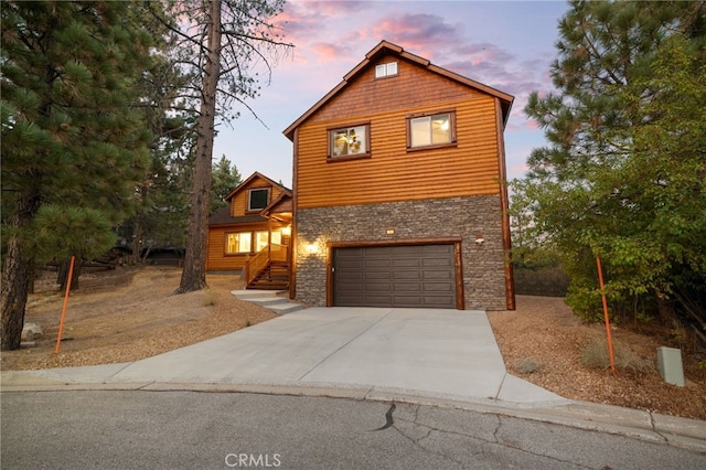 view of front of property featuring a garage