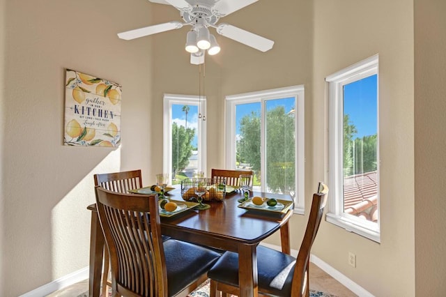 dining space featuring ceiling fan