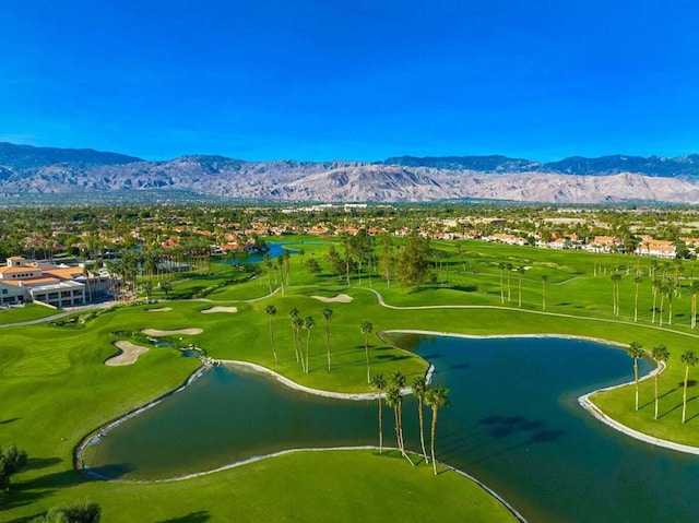 bird's eye view featuring a water and mountain view