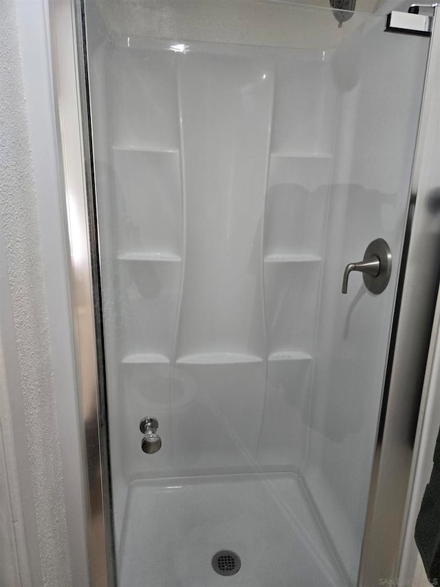 bathroom with walk in shower