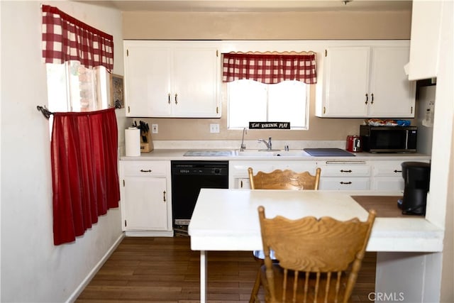 kitchen featuring dishwasher, white cabinets, and a wealth of natural light