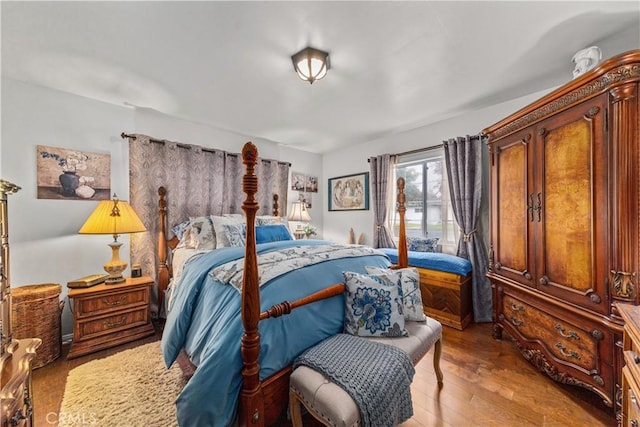 bedroom with light hardwood / wood-style floors