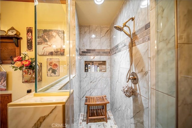 bathroom featuring tiled shower