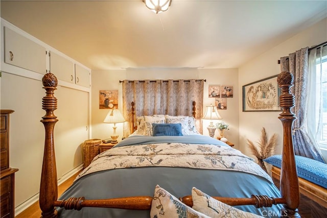 bedroom featuring hardwood / wood-style floors