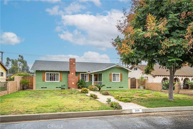 view of front of property featuring a front yard