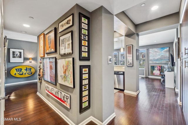 hall with dark hardwood / wood-style flooring