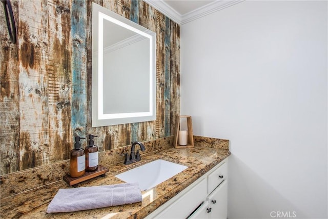 bathroom featuring vanity and crown molding