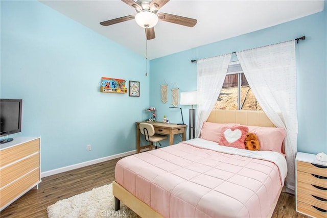 bedroom featuring ceiling fan and dark hardwood / wood-style flooring