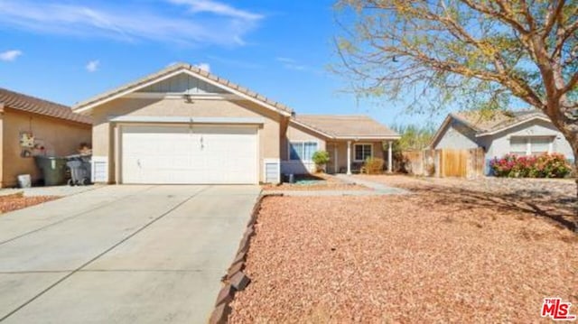 ranch-style home featuring a garage