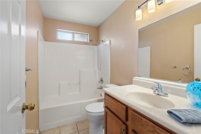 full bathroom featuring vanity, washtub / shower combination, toilet, and tile patterned floors