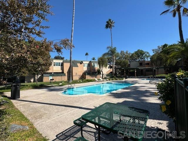 view of swimming pool featuring a patio