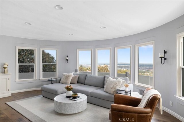 6401 Corsini Pl, Rancho Palos Verdes, CA 90275 - living room with wood finished floors, baseboards, and recessed lighting