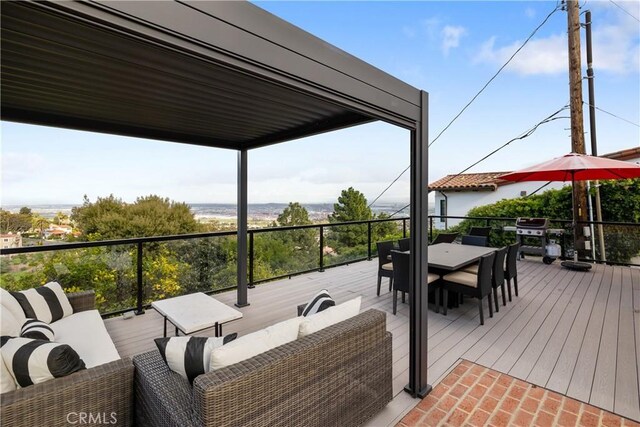 wooden deck with an outdoor hangout area