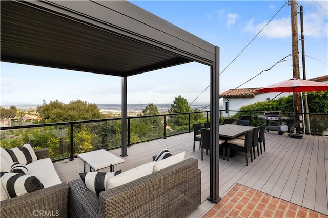 deck featuring outdoor dining area and an outdoor living space