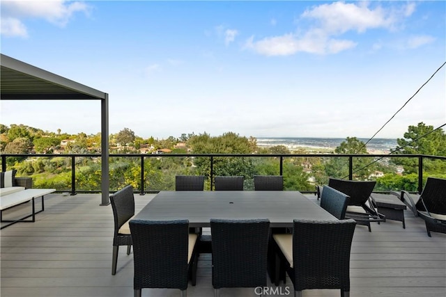 deck featuring a water view