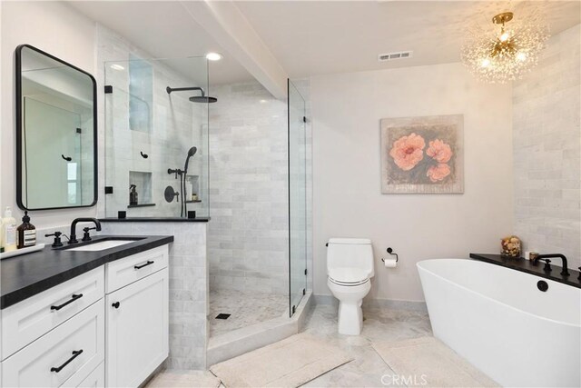 full bathroom with toilet, vanity, a chandelier, and shower with separate bathtub