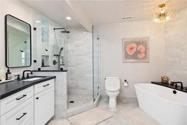 6401 Corsini Pl, Rancho Palos Verdes, CA 90275 - bathroom with a stall shower, vanity, a freestanding tub, toilet, and recessed lighting