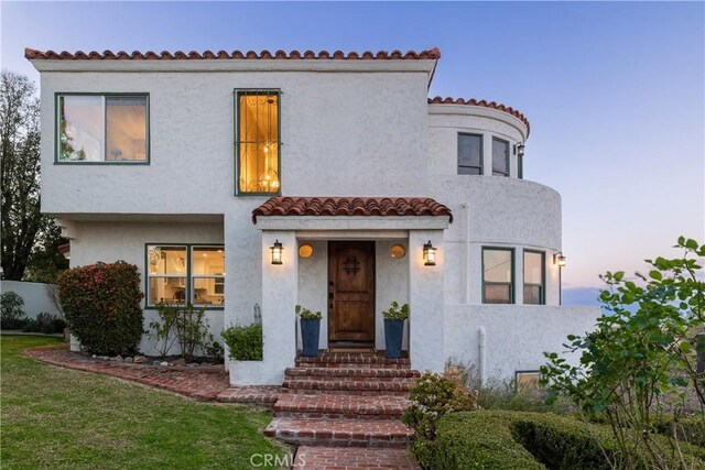 6401 Corsini Pl, Rancho Palos Verdes, CA 90275 - mediterranean / spanish house featuring stucco siding and a tiled roof
