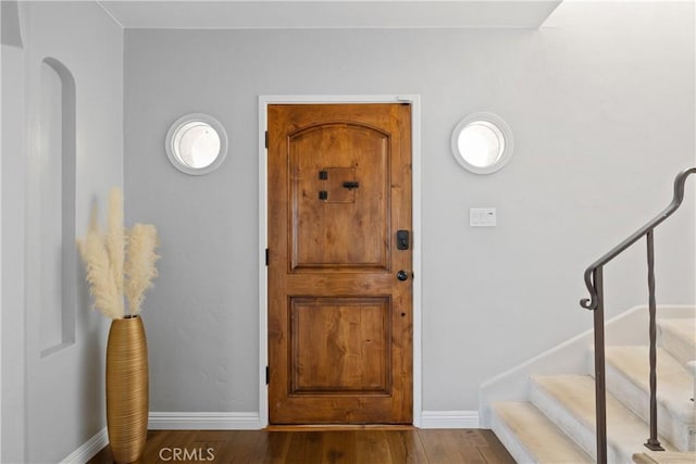 entrance foyer featuring wood-type flooring