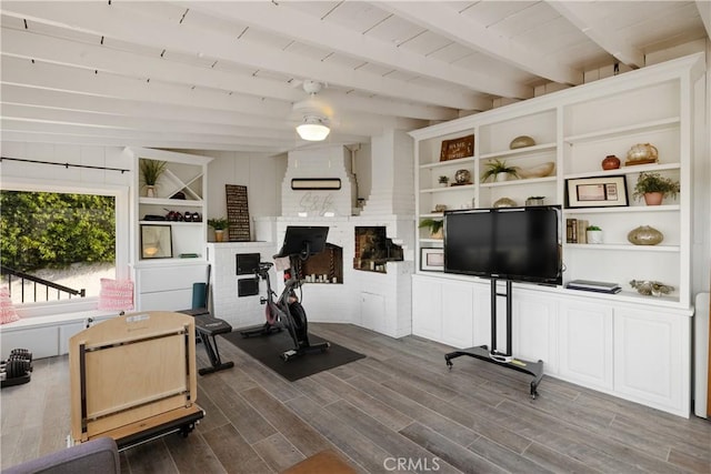 exercise room featuring wood-type flooring and wood ceiling