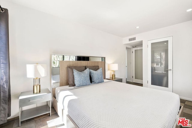 bedroom featuring hardwood / wood-style floors