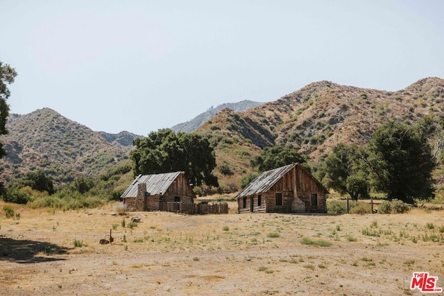 property view of mountains featuring a rural view