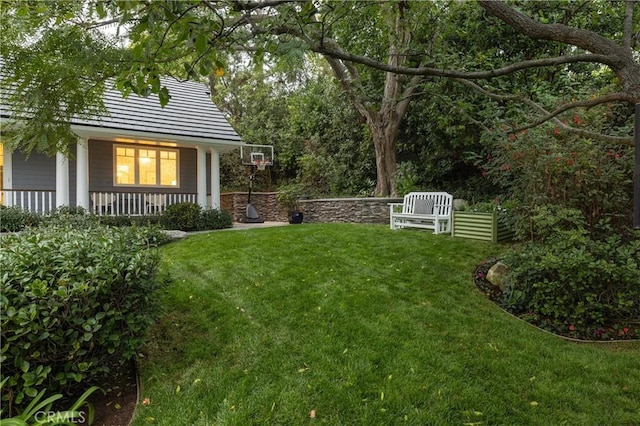 view of yard featuring a porch