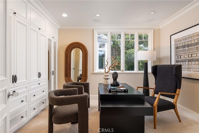 sitting room with light carpet and ornamental molding