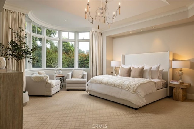 carpeted bedroom featuring crown molding and a notable chandelier