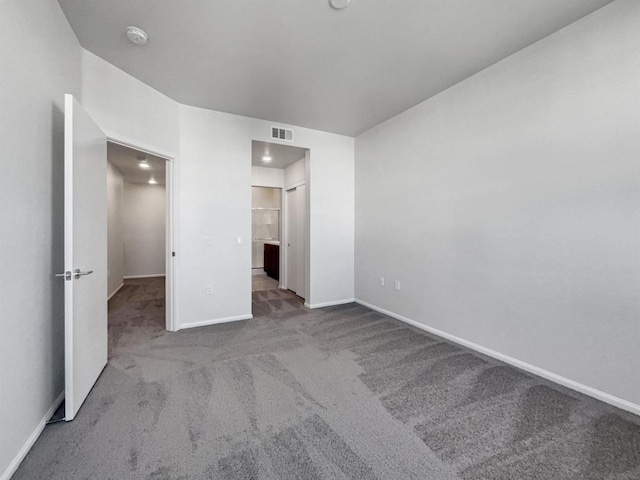 unfurnished bedroom featuring carpet