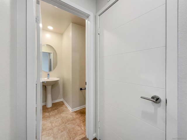 bathroom featuring tile patterned floors and sink